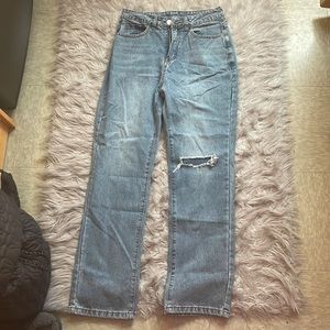 Light blue ripped jeans